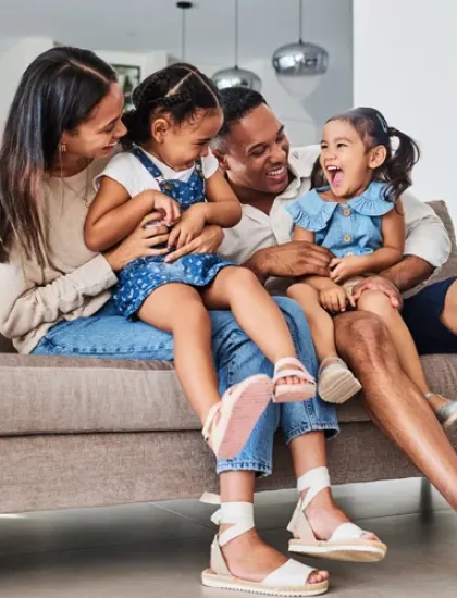 family laughing and having fun in a pest free home